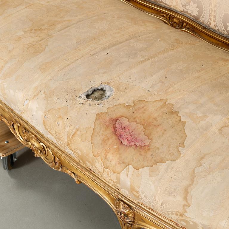 A rococo sofa from the first half of the 20th century.