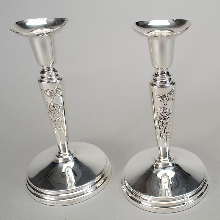 A pair of silver candlesticks by Meya Lerible for Mema, Linköping 1994.