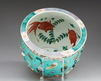 A large moulded famille rose fish basin, Qing dynasty, 19th Century.