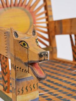 Gérard Rigot, a sculpted and painted oak chair, exectued in his studio, France, second half of the 20th century.