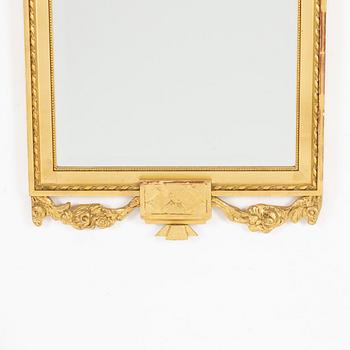 A Gustavian style console table and mirror, mid 20th century.