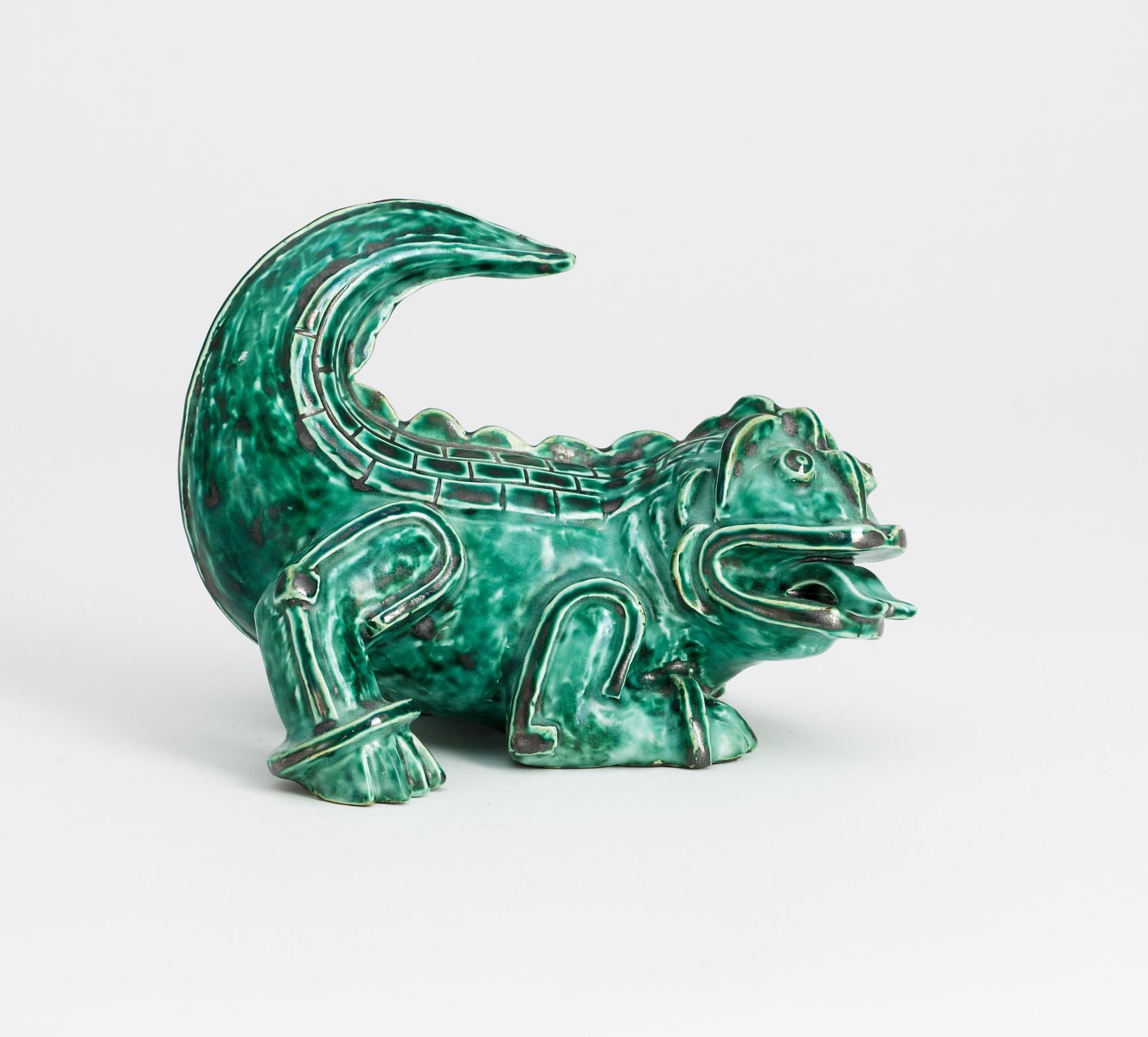 A Wilhelm Kåge stoneware figure of a dragon puppy, Gustavsberg circa 1940.