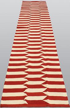 A runner, flat weave, ca 397 x 83 cm.