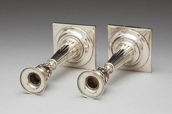 A pair of German 19th century silver candlesticks, makers mark of Johann Rudolf Haller, Augsburg 1801.