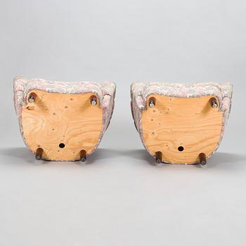 A pair of late 20th century armchairs.