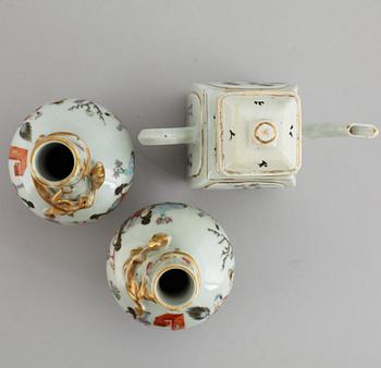 A pair of famille rose vases, and a tea pot, Qing dynasty, 19th Century and circa 1900.