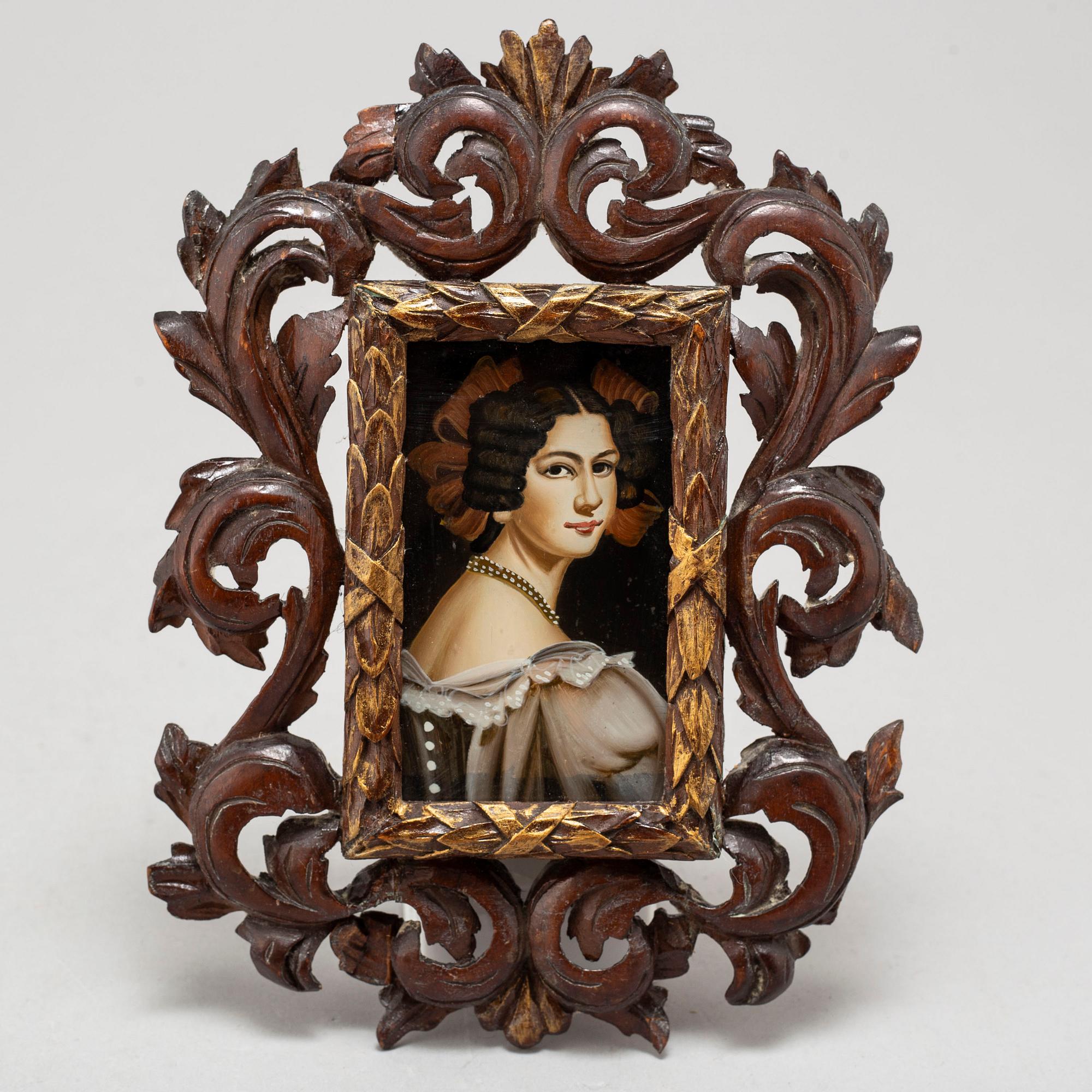 A 19TH CENTURY GLASS PAINTING.