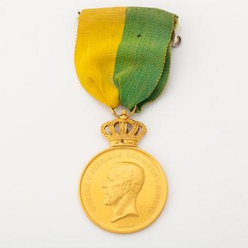 A Swedish gold medal, 18 carat.