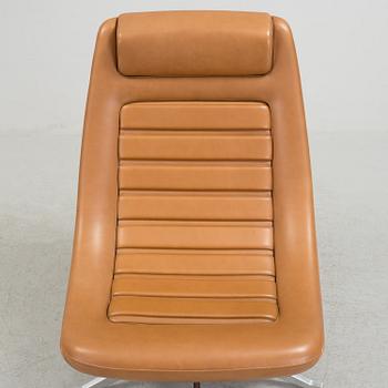 A "Manzù Lounge Chair" by Pio Manzu for Alias.