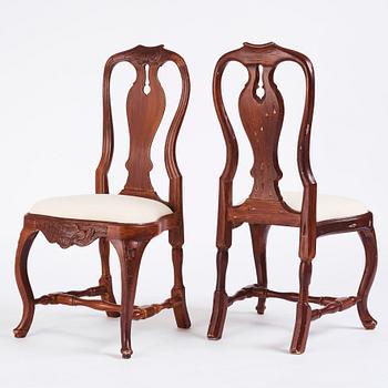 A set of eight matched (2+6) Swedish Rococo chairs, Stockholm, second part of the 18th century.