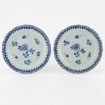 A set of four blue and white dinner plates, Qing dynasty, 18th Century.