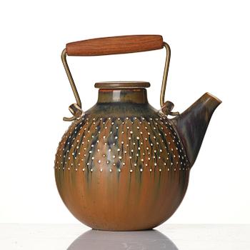 Stig Lindberg, a stoneware teapot and 4 bowls, Gustavsberg Studio, Sweden, 1960-63.