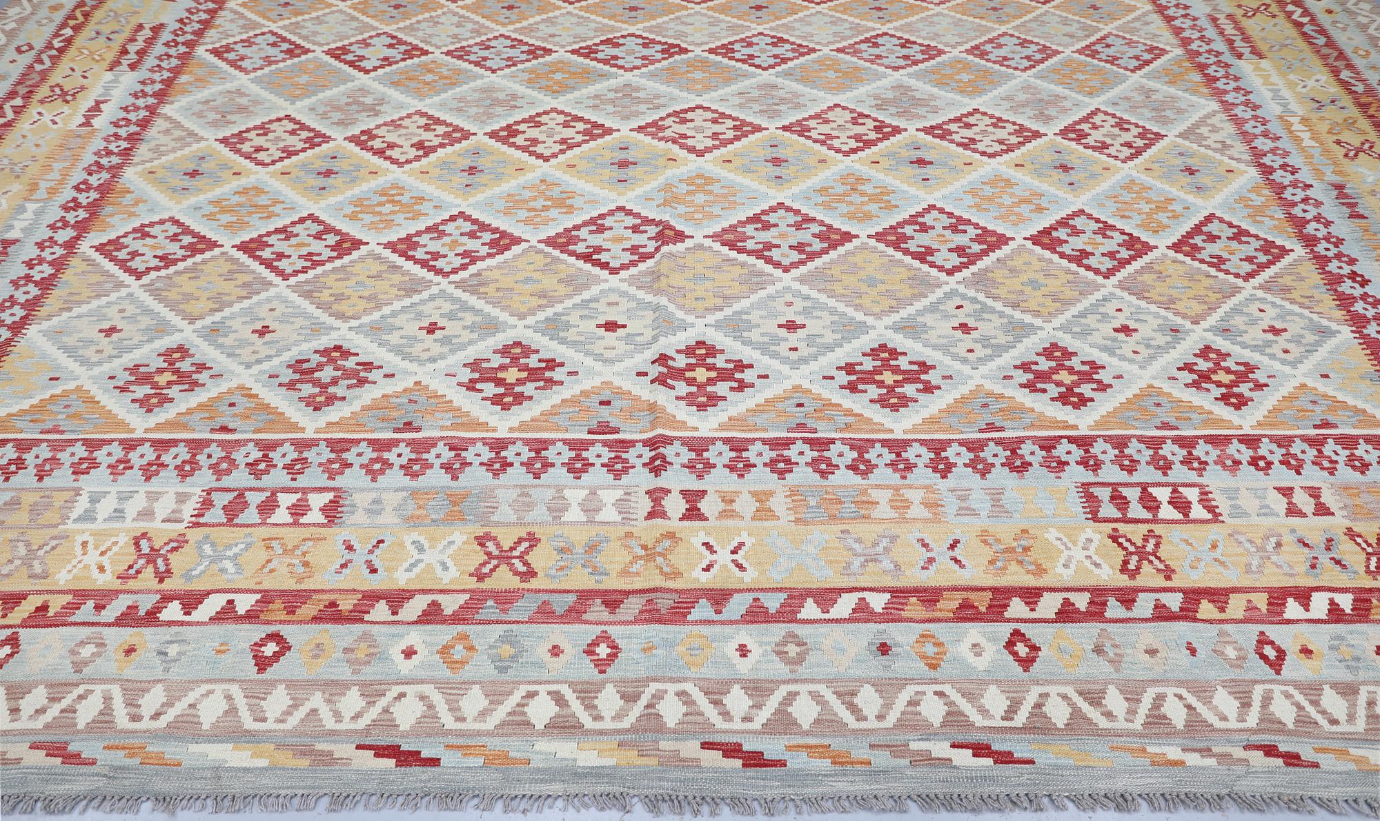 A Kilim carpet, approx. 591 x 401 cm.