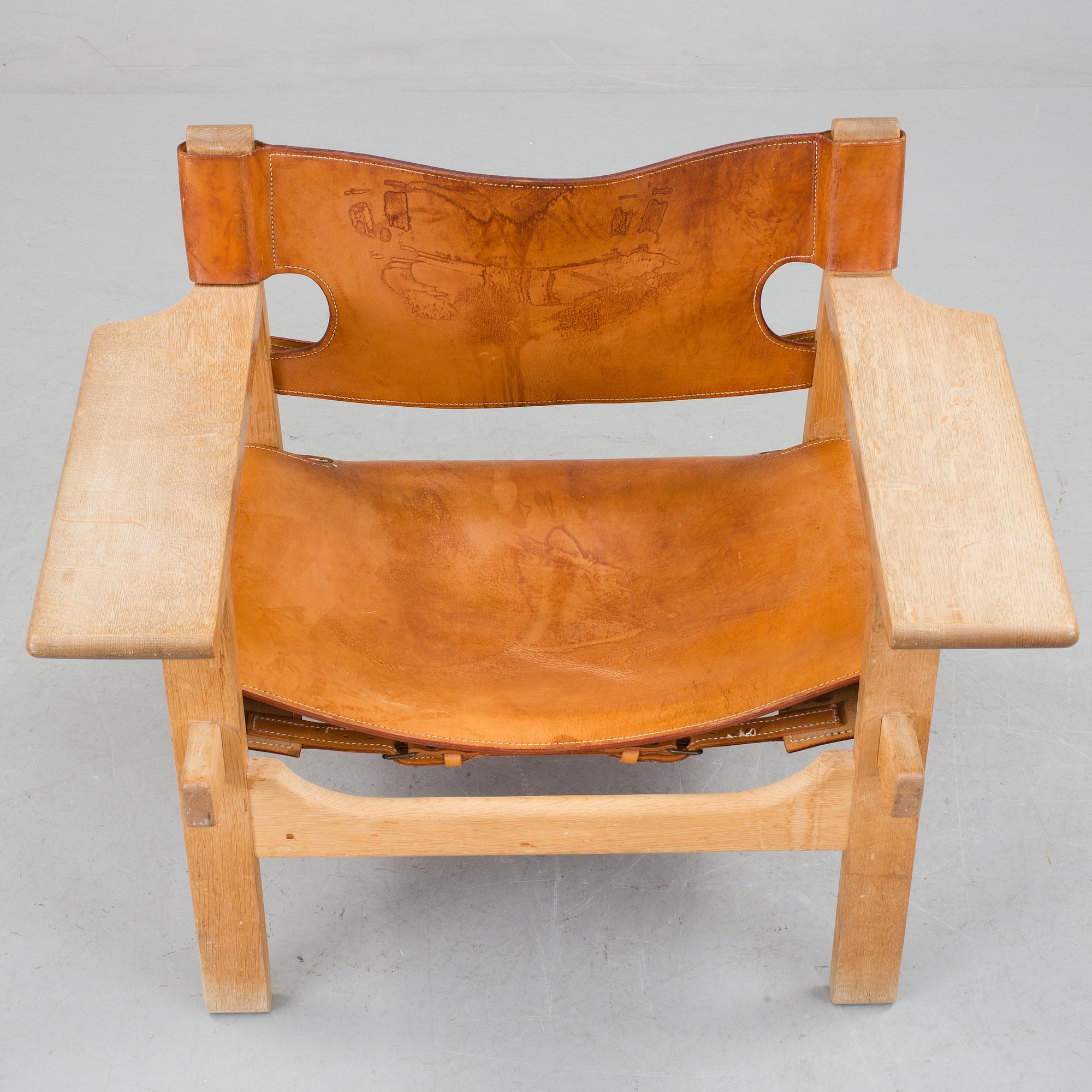 A Børge Mogensen oak and leather 'Spanish Chair' by Fredericia Stolefabrik, Denmark.