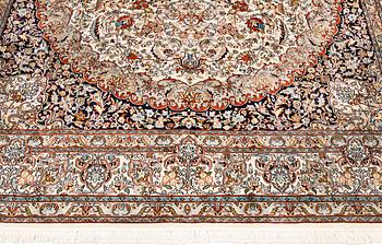 A silk Kashmir carpet, approx. 300 x 200 cm.