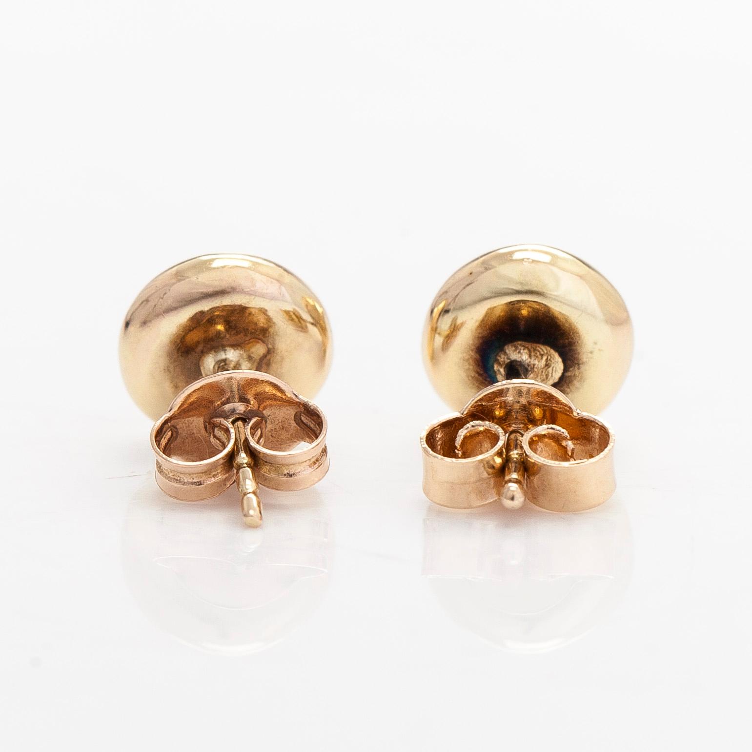 Earrings in 14K gold with brilliant-cut diamonds, total approximately 0.40 ct.