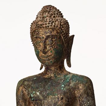 A standing figure of Buddha, Thailand, 18th Century.
