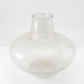 Glass dome for exterior lighting.