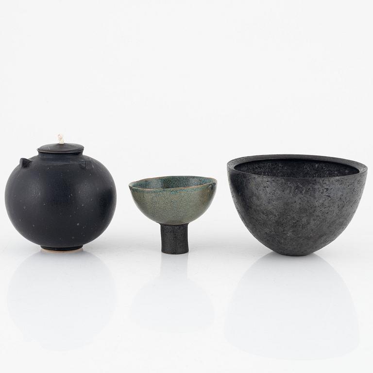 Bowls, a pair, and an oil lamp, by Ulrika Wallin among others, circa 2000.