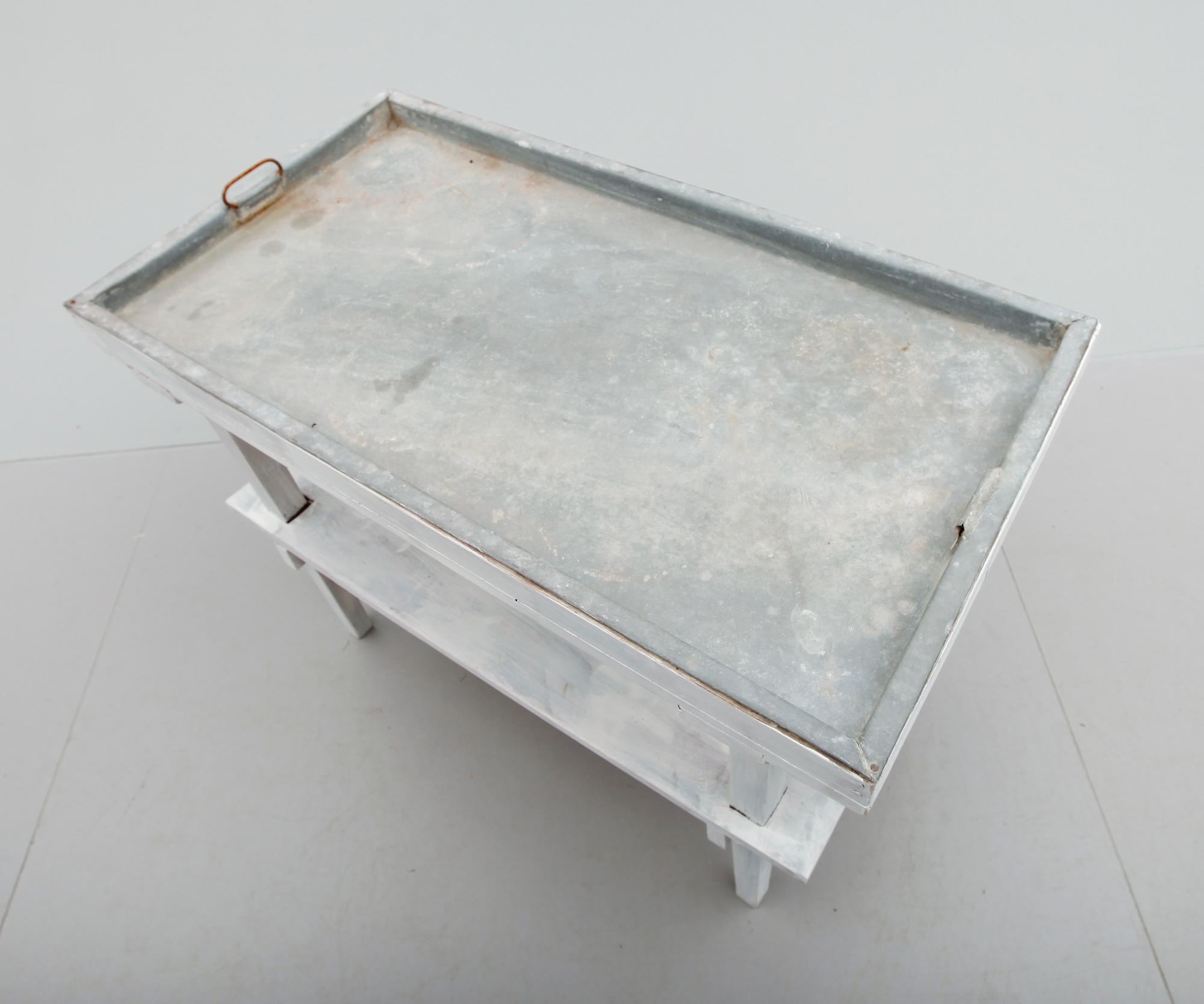 BLOMSTERBORD, 1900-talets första hälft.