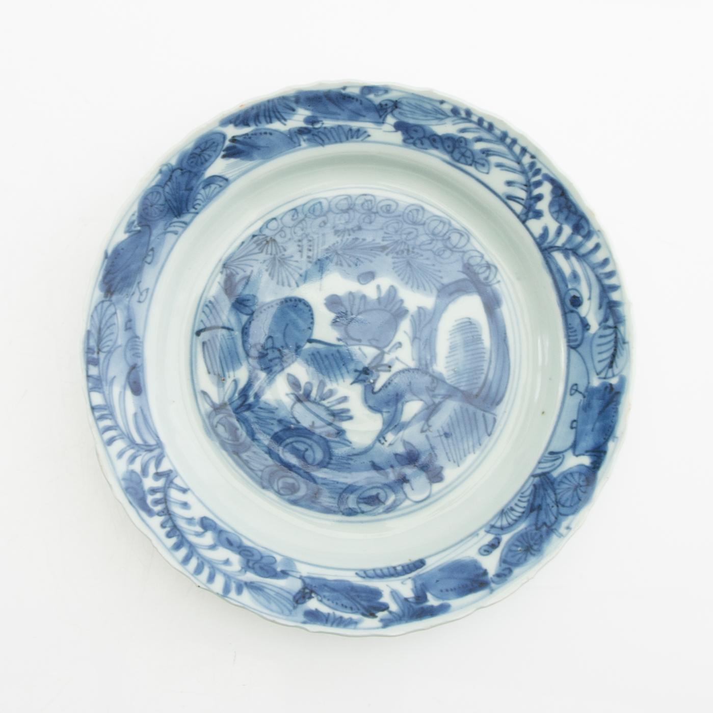 A blue and white dish and cup, Ming dynasty.