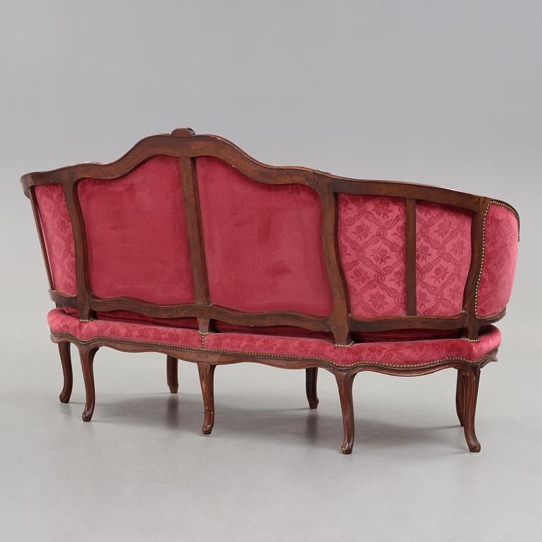 A Louis XV mid 18th century sofa.