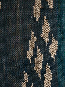 Lillian Holm, a tapestry, flat weave, ca 180,5 x 82 cm, signed LH. With the frame ca 182x79 cm.