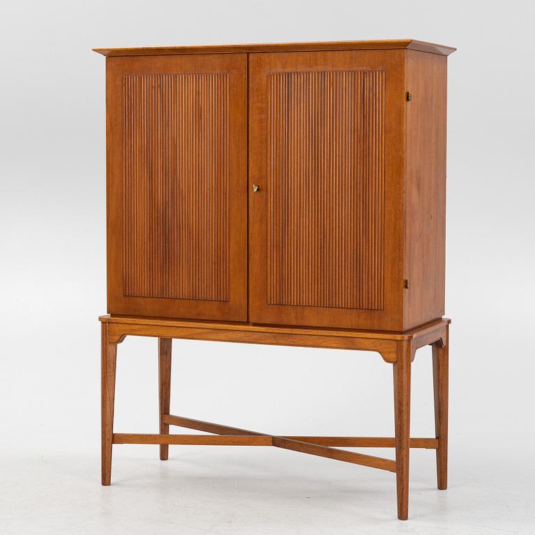 A Swedish Modern cabinet, Nils Jonsson Möbelsnickeri, Tibro, mid 20th Century.