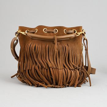 Yves Saint Laurent, a suede fringe handbag.