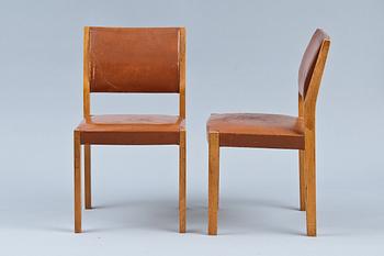 Alvar Aalto, A DINING TABLE AND CHAIRS.