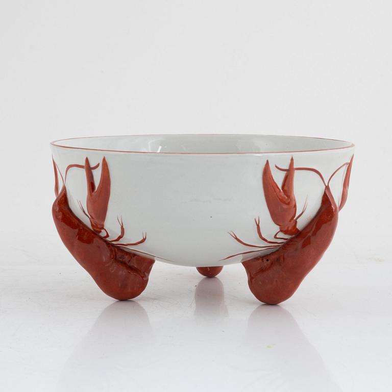 A creamware crayfish bowl, Rörstrand. Twelve side plates, Gustafsberg, early 20th Century.