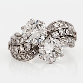 A WA Bolin platinum ring set with two round brilliant-cut diamonds with a total weight of ca 3.50 cts.