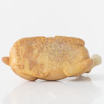 A carved nephrite figure of a reclining horse, 20th Century.