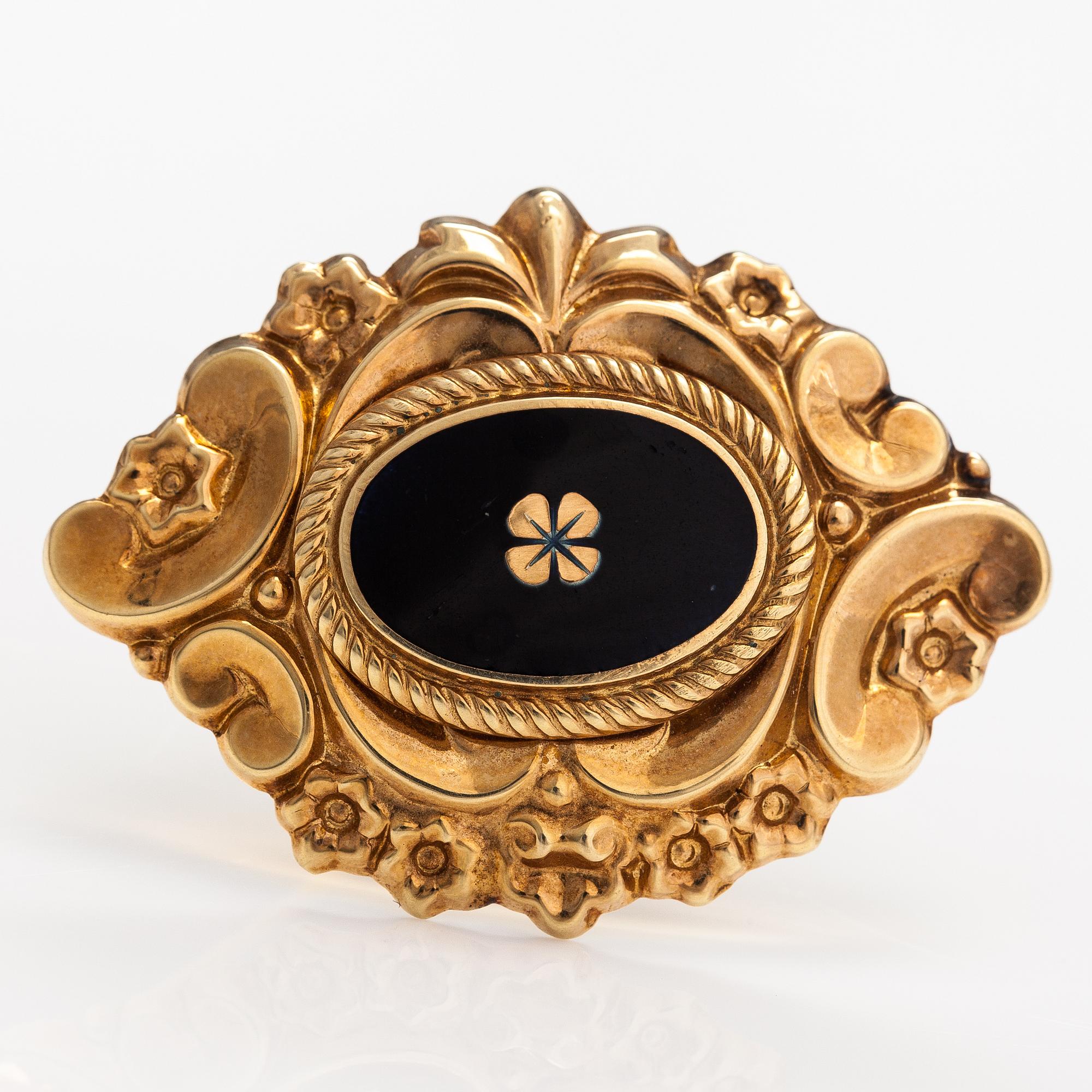 A 14K gold brooch with enamel. Kello-Tuomi Oy, Helsinki 1969.