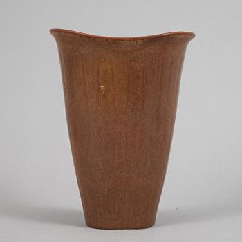 Tea pot, two bowls, two creamers, and a vase by Gunnar Nylund, stoneware, Rörstrand.