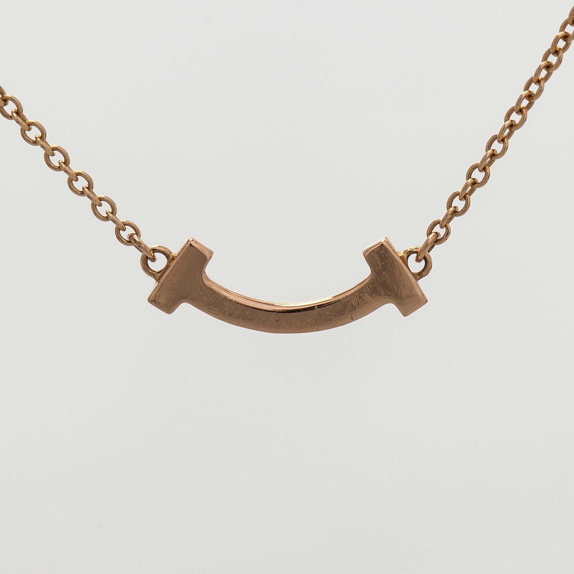 Tiffany & Co, halsband, "T Smile", 18K guld och briljantslipade diamanter.