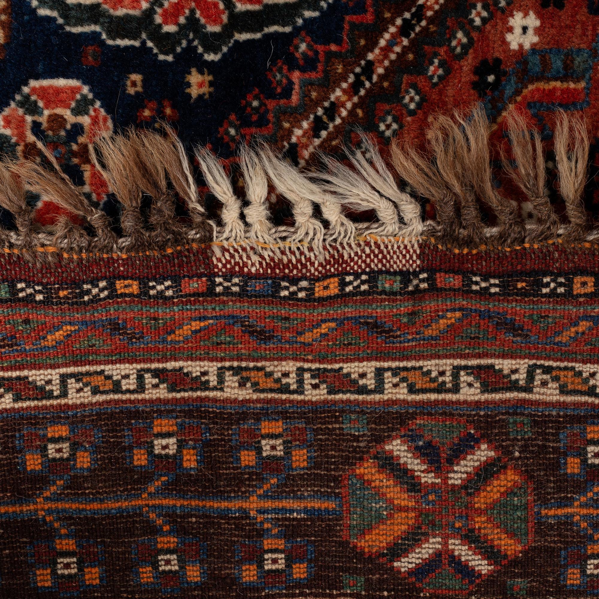 A rug, semi-antique Kashgai, ca 210 x 159 cm.
