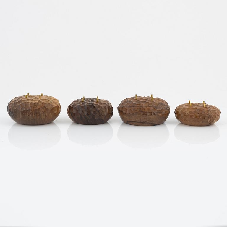 Magnus Ek, a set of four walnut wood canapé holders for Oaxen Krog.