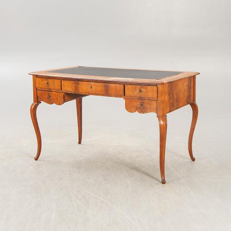 A Neo Rococo walnut desk later part of the 20th century.