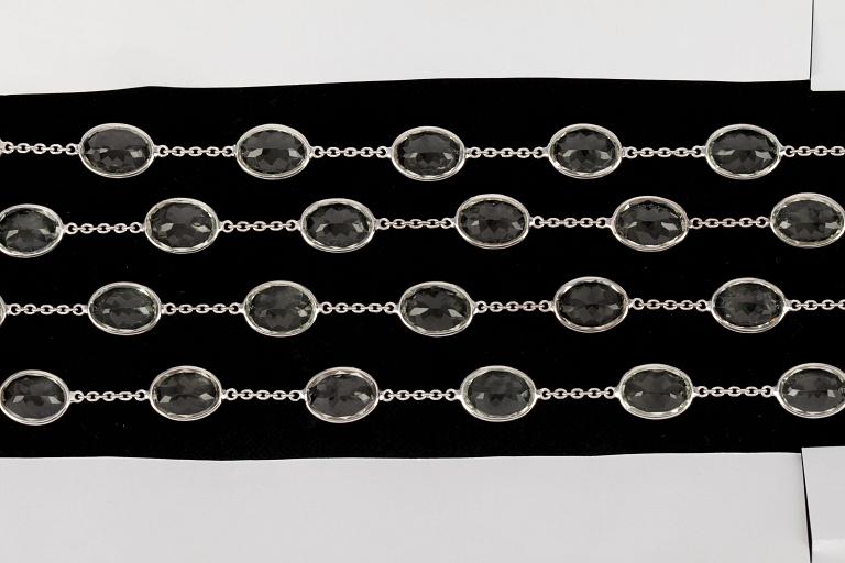 A long green quartz necklace.