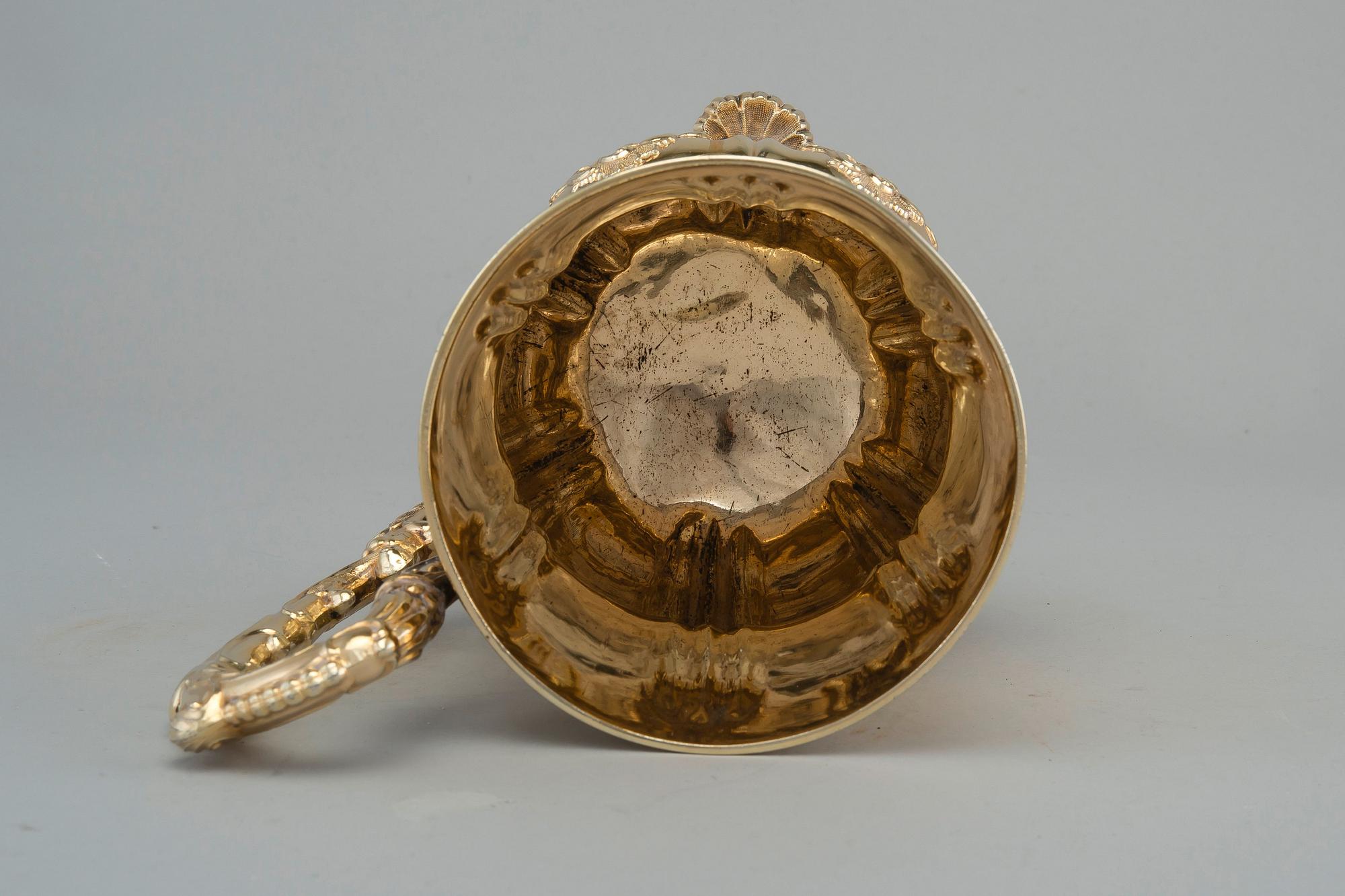 A TANKARD, 84 silver. Gilt. Carl Magnus Stahle St. Petersburg 1842. Height 20 cm, weight 630 g.
