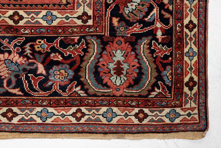 A Sultanabad carpet, west Persia c. 530 x 378 cm.