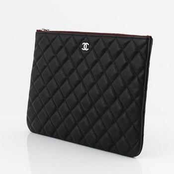 Chanel, a black caviar leather clutch, 2020.