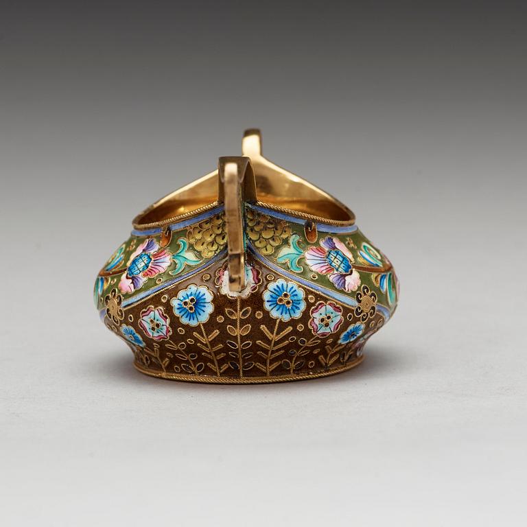 A Russian 20th century silver-gilt and enamel kovsh, marks of the 20th Artell, Moscow 1908-1917.
