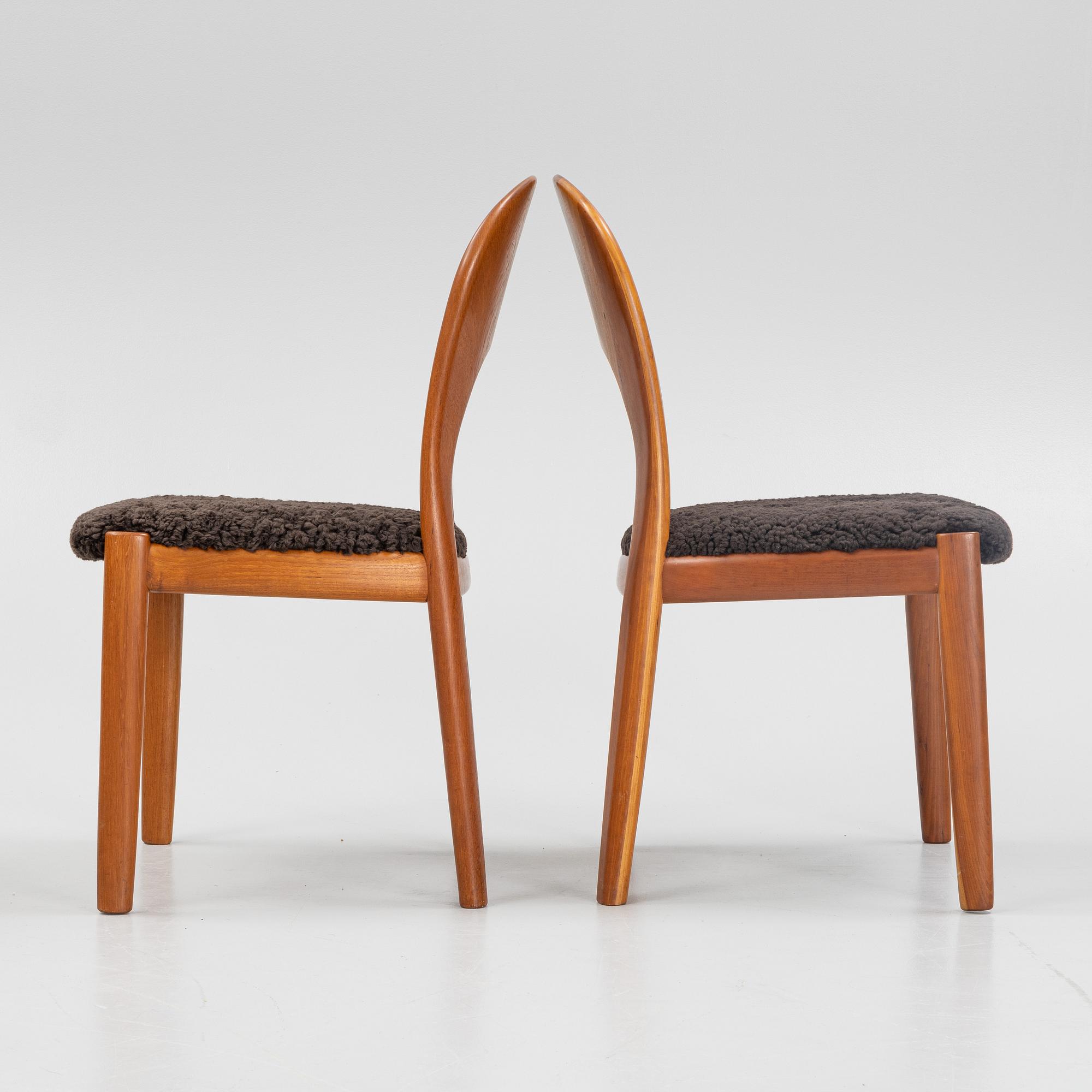 Niels Koefoed, eight teak dining chairs upholstered in new sheep skin, Denmark, 1960's.