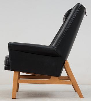 A Tove & Edvard Kindt- Larsen 'Glimminge' oak and black leather armchair, 1960's.