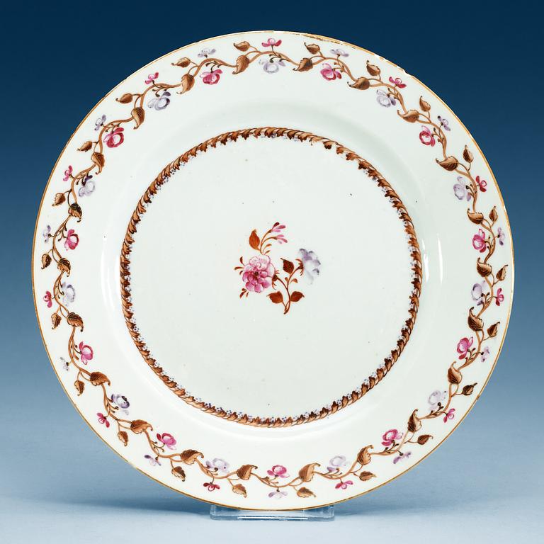 A set of 12 famille rose dinner plates, Qing dynasty, Qianlong (1736-95).