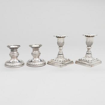 Two pairs of silver candlesticks, England 1889 and Finland 1975.