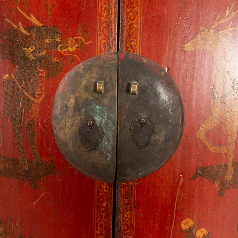 A 20th century Chinese painted wooden cabinet.