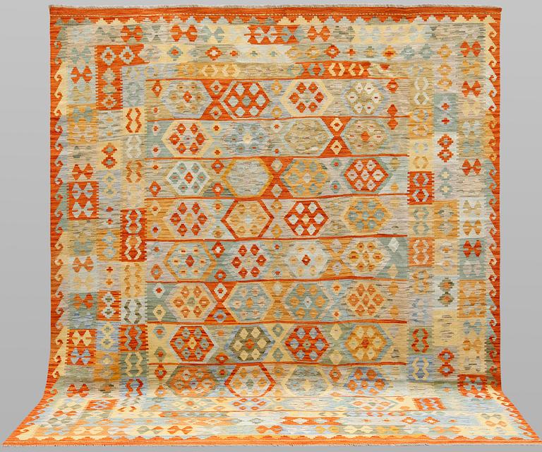 A carpet, Kilim, ca 297 x 252 cm.